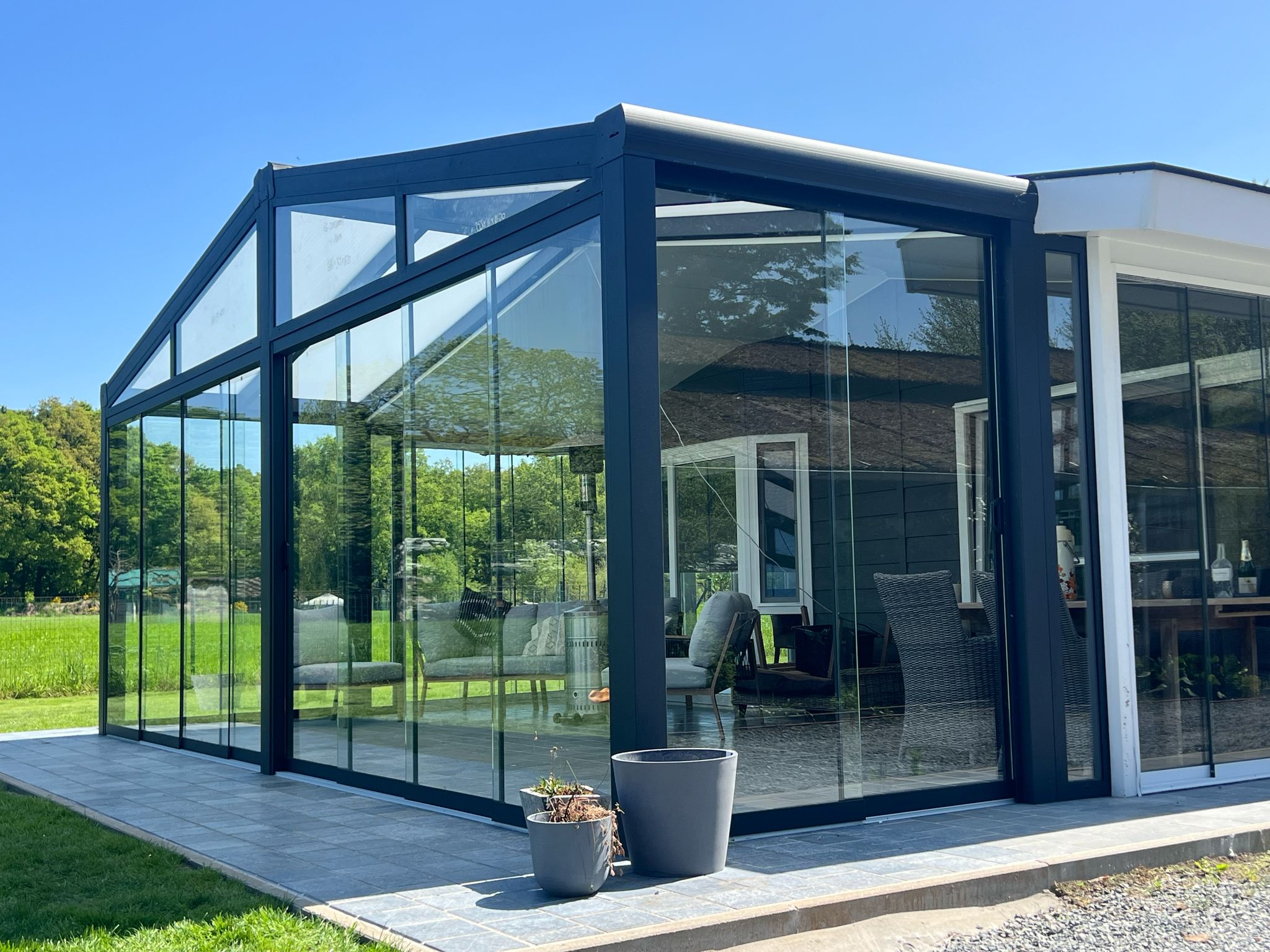 A bright, modern porch next to the garden